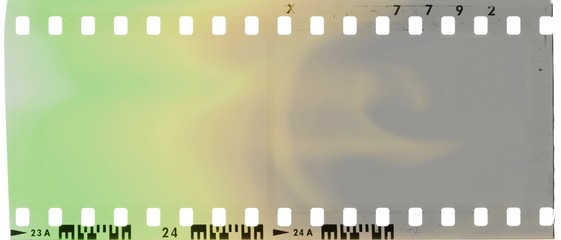 Vintage film strip frame with green and yellow tones.