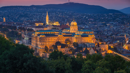 Budapest, Hungary - The beautiful Buda Castle Royal Palace and Matthias Church at magic hour with colorful sky