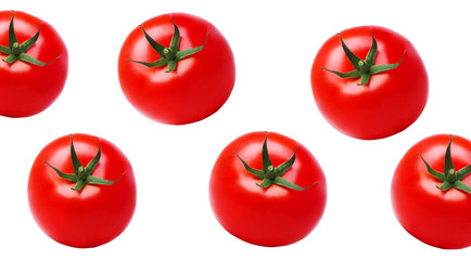 Fototapeta premium A few tomatoes on the white isolated background, closeup