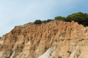 Fototapeta na wymiar Red mountains in Algarve, south of Portugal