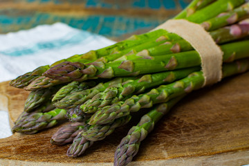 Green young asparagus shoots – premium healtry food, ready to cook and for grill