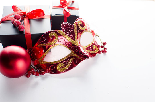 Black christmas  gift  box with red ribbon and nask