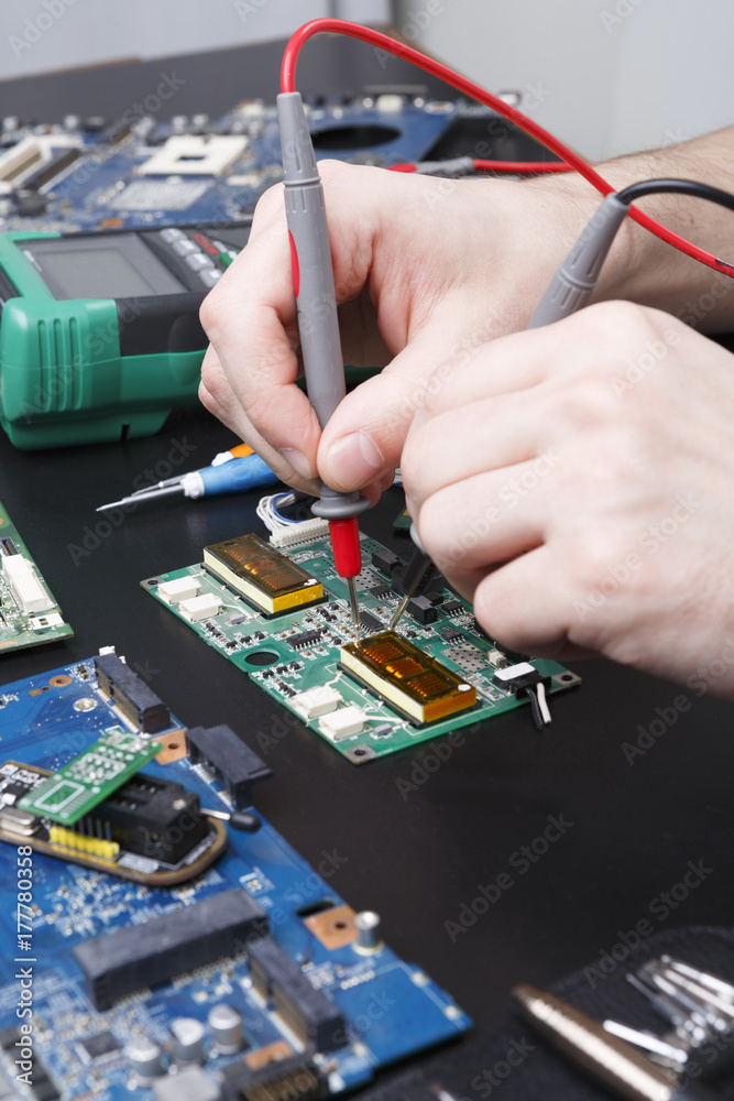 Poster electronic circuit board inspecting close up