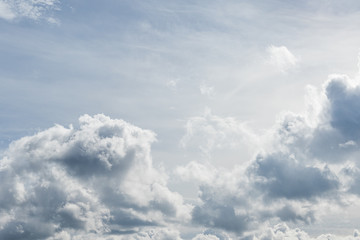 Fototapeta na wymiar White fluffy clouds in the sky