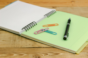 notebook and pen isolated on the white