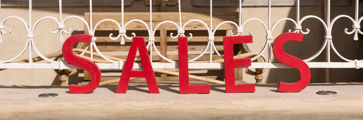 Sales, Werbung auf der Mauer