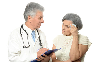 Elderly doctor with a patient