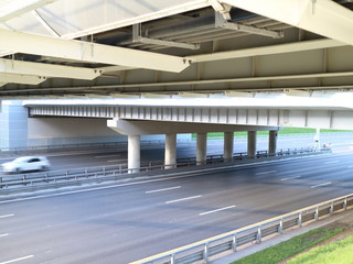 high-speed road at sunset over the sea city	