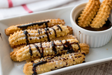 Spanish Dessert Churros with Chocolate Sauce / Baked Sweet Dough.