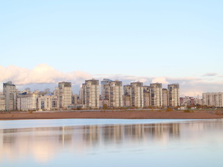 Obraz premium Urban blocks high-rise buildings on the beach at sunset