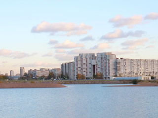 Obraz premium Urban blocks high-rise buildings on the beach at sunset