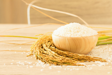 Close up Thai jasmine rice in bowl on wooden table