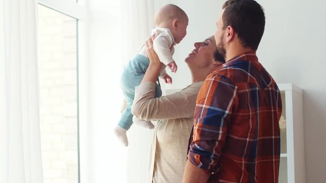 happy family with baby at home