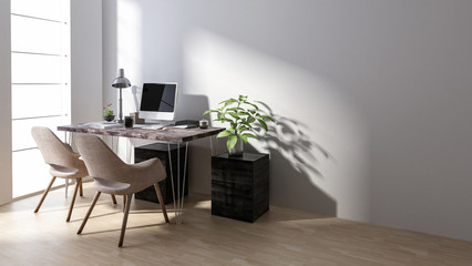 Desk with computer at empty workstation