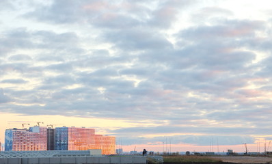 Fototapeta premium autumn sunset with cumulus clouds