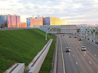 high-speed road at sunset over the sea city