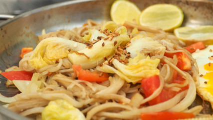 Chinese cabbage topping on Enoki mushrooms fried with butter