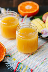 Mango and orange detox juice made from fresh fruits.