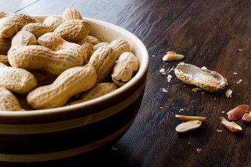 Bowl of Dry Salted Roasted Peanuts in Shell.