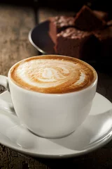 Foto op Plexiglas Hot frothy cappuccino coffee with chocolate cake © exclusive-design