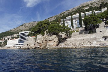 wild coast of croatian town dubrovnik from a boat