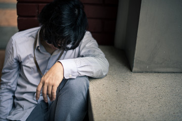 business man is stressed from his work. depression and anxiety concept.
