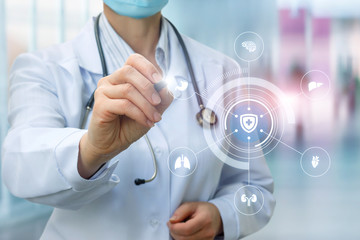 Doctor draws a structure for protecting the internal organs of a person .