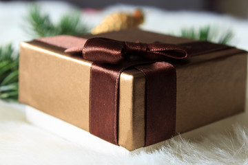 A box with a Christmas present. Selective focus.