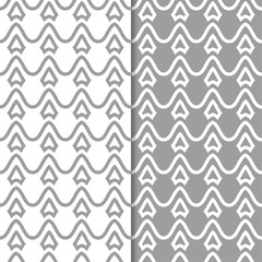 Gray and white geometric seamless patterns