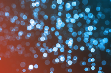 gradient red and blue abstract bokeh background christmas and happy new year celebration concept.