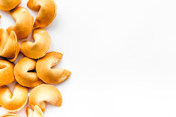 Prediction in fortune cookie on white background flat lay mockup