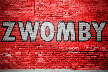 Fototapeta premium Zwomby Ziegelsteinmauer Graffiti