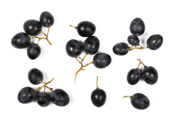 Dark grapes, isolated on white background, top view