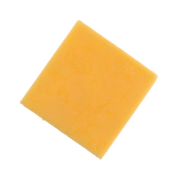 Top view of a square gouda cheese slice isolated on a white background.