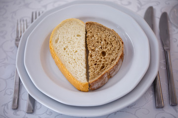 two different slices of bread on a plate