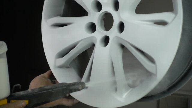 Powder coating of auto disk