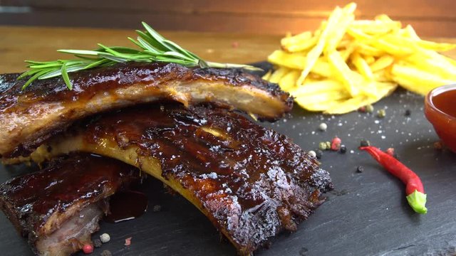 grilled bbq ribs on stone plate