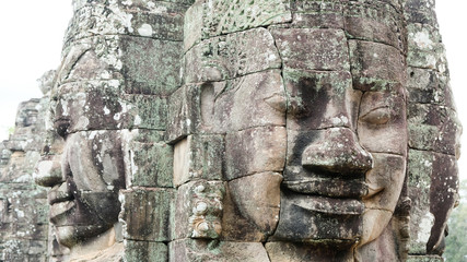 2 Faces of Bayon Temple at the corner of Angkor Thom, Siem Reap, Cambia