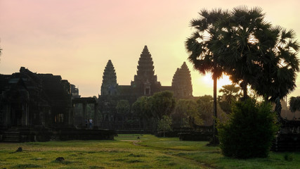 Fototapeta na wymiar Angkor Wat sunset with pink orange sky background