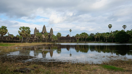 Fototapeta na wymiar Angkor Wat with blue sky and refection in lake, Siem Reap, Cambodia