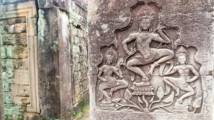 Apsara dancing at the corner of the wall of Angkor Wat, Siem Reap, Cambodia