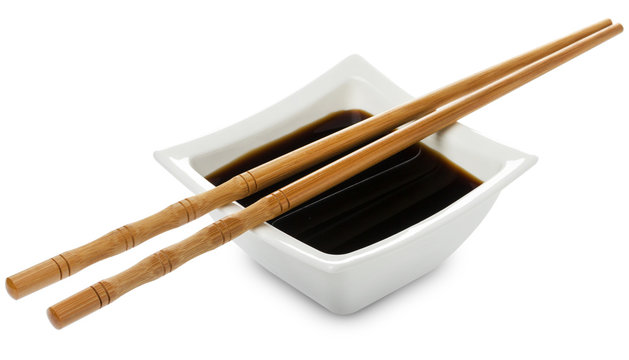 Square bowl of soy sauce isolated on white background