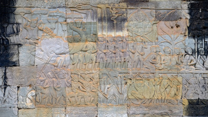 Multicolor bas relief on the wall at Angkor Wat, Siem Reap, Cambodia