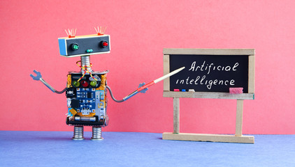 Artificial intelligence concept. Robot teacher explains modern theory. Classroom interior with...