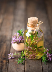 Thyme essential oil © pilipphoto