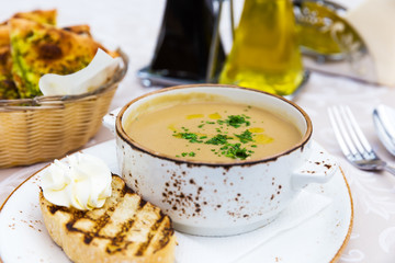 Mushroom cream soup with green parsley