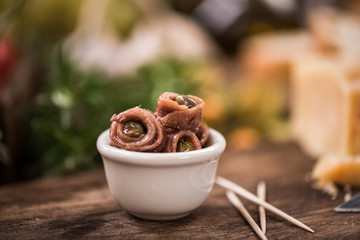 Anchovy with capers in bowl,spanish tapa bar food