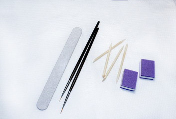 tools for manicure on a white background