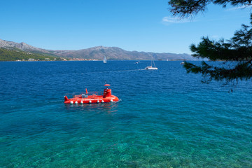 Red boat on the mediterranean sea