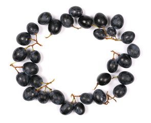 Dark grapes, isolated on white background, top view